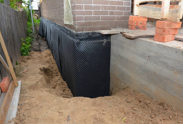 SJ Waterproofing Pros technician performing targeted Waterproofing assessment in Richmond, MN